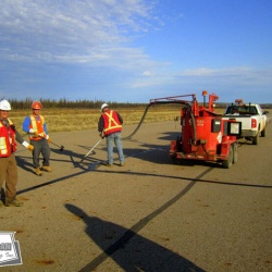 Hot pour crack sealing on runway