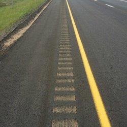 Sand Sealing rumble strips on Highway 1 using CRF Restorative emulsion. 